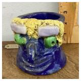 Pottery face mug