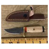 Fixed blade pocket knife with sheath