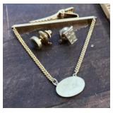 Tie bar and tie tacks