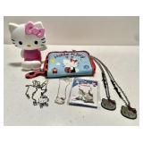 Hello Kitty jewelry, coin purse, and figure