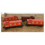 4 Lionel pre-war tinplate cabooses