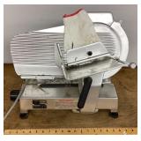 Intedge commercial meat slicer --powers on