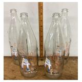 4 seltzer bottles