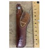 Brown leather handgun holster