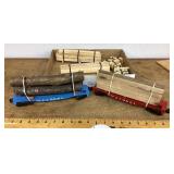 2 Lionel logging cars and accessories