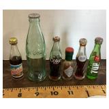 Mini soda and tabasco bottles