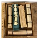 2 model train cars with lumber loads