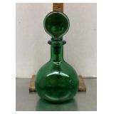 Green glass perfume bottle