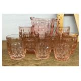 Pink Depression glass pitcher and 8 glasses