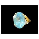 14k Yellow Gold Ring with Oval Blue Stone and Accent Stones