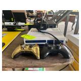 Xbox 360 and two controllers