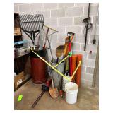 Corner Lot in Tool Room:  Brooms, rake, Sprayer, Misc