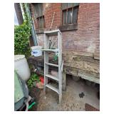Lot - Assorted Industrial and Shop Supplies: Workbench, Ladder, Hoses, and Barrels