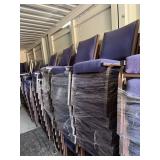 Blue stackable cushioned upholstered chairs,