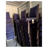 Blue stackable cushioned upholstered chairs,