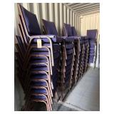 Blue stackable cushioned upholstered chairs,