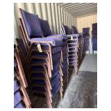 Blue stackable cushioned upholstered chairs,