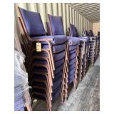 Blue stackable cushioned upholstered chairs,