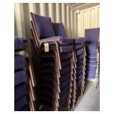 Blue stackable cushioned upholstered chairs,