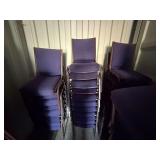 Blue stackable cushioned upholstered chairs,