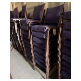 Blue stackable cushioned upholstered chairs,