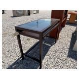 Wooden desk with glass top