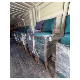 Green stackable cushioned upholstered chairs,