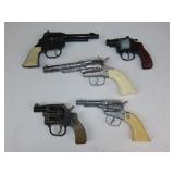 Five Toy or Cap Guns