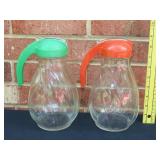 Two Syrup Pitchers