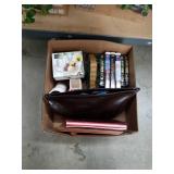 Box of videos and camera