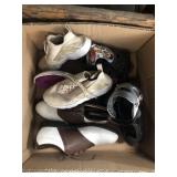 Box of Nike golf shoes size 12, Nike women