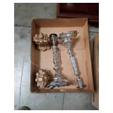 Box of candle holders and heavy brass bookends