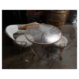 Round metal patio table and two chairs