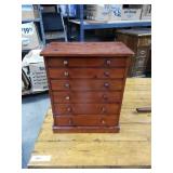 Cabinet with collection of eggshells