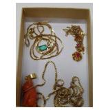 Floral pendent 10k dog scratched 14k chain and