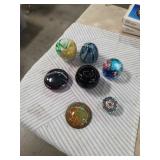 Collection of 8 paper weights, some signed