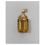 14k gold pendent with yellow Stone unmarked