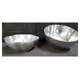 Pair of designer metal fruit bowls marked on