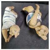 Pair of signed stoneware figurines