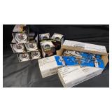 Chrome hooks, silver crown light bulbs in box