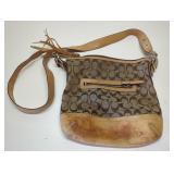 Coach designer purse. With serial number inside.