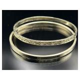 Pair of sterling silver bangle bracelets, 32.44g
