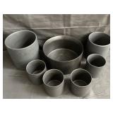 Set of Groves & Co. ceramic candle holders and