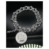 Forstner sterling silver charm bracelet, 18.6g