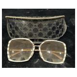 Designer style sunglasses marked MNG