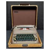 Vintage Smith Corona typewriter in case,