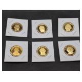 Six proof US Presidential Dollar coins in holders
