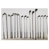 Group of golf clubs box lot on floor