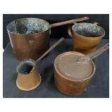 Group of vintage copper pots