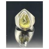 Sterling silver ring with yellow faceted stone,